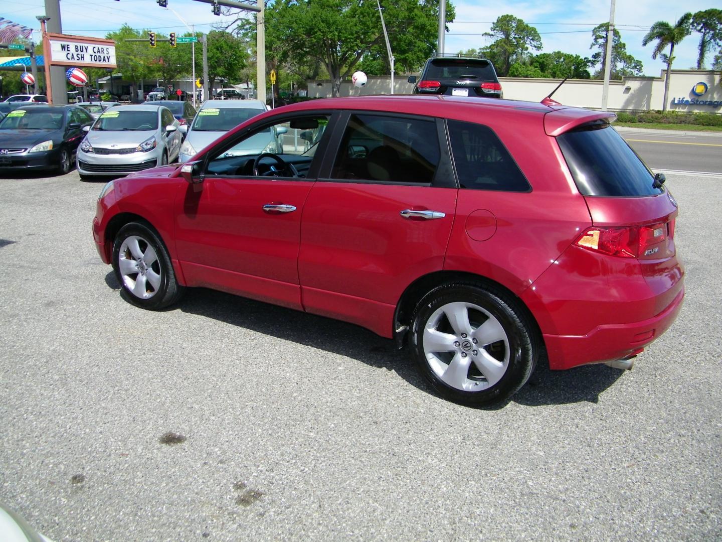 2008 Red /Gray Acura RDX 5-Spd AT (5J8TB18228A) with an 2.3L L4 DOHC 16V engine, 5-Speed Automatic Overdrive transmission, located at 4000 Bee Ridge Road, Sarasota, FL, 34233, (941) 926-0300, 27.298664, -82.489151 - Photo#2